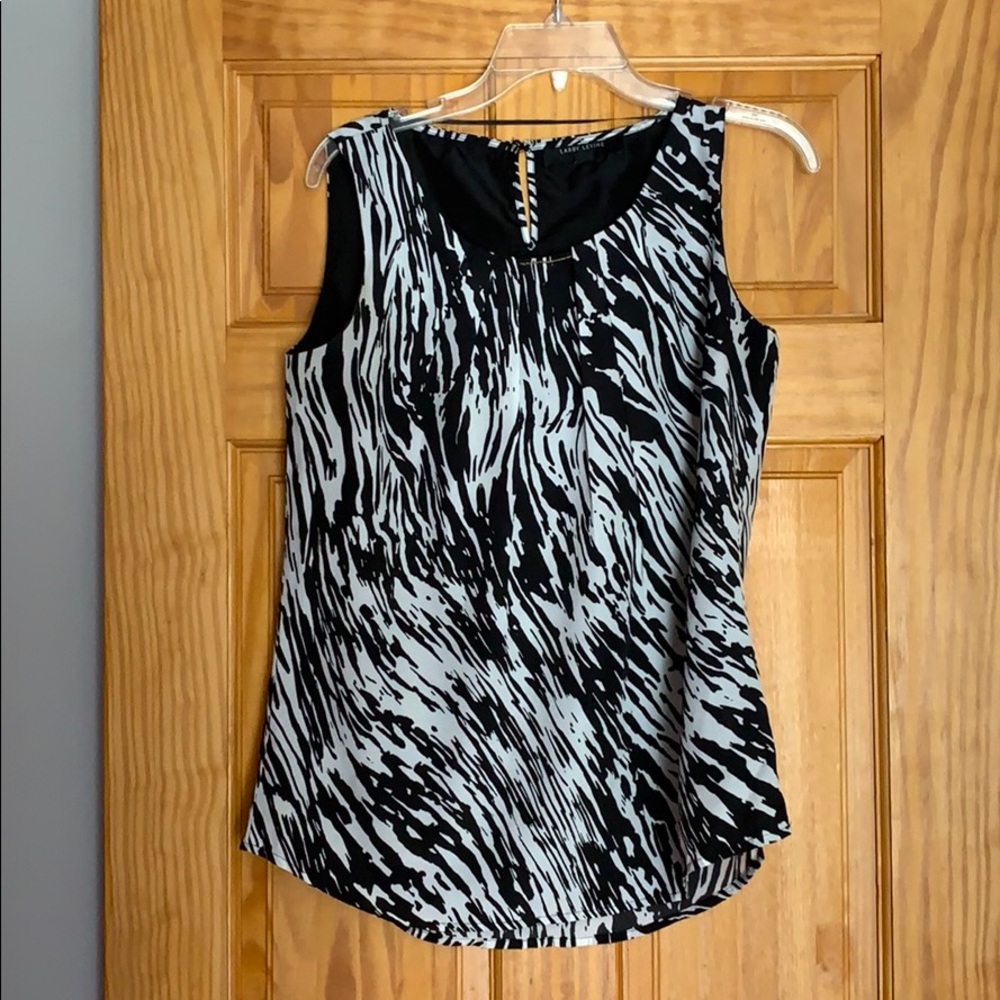 Black and white sleeveless blouse